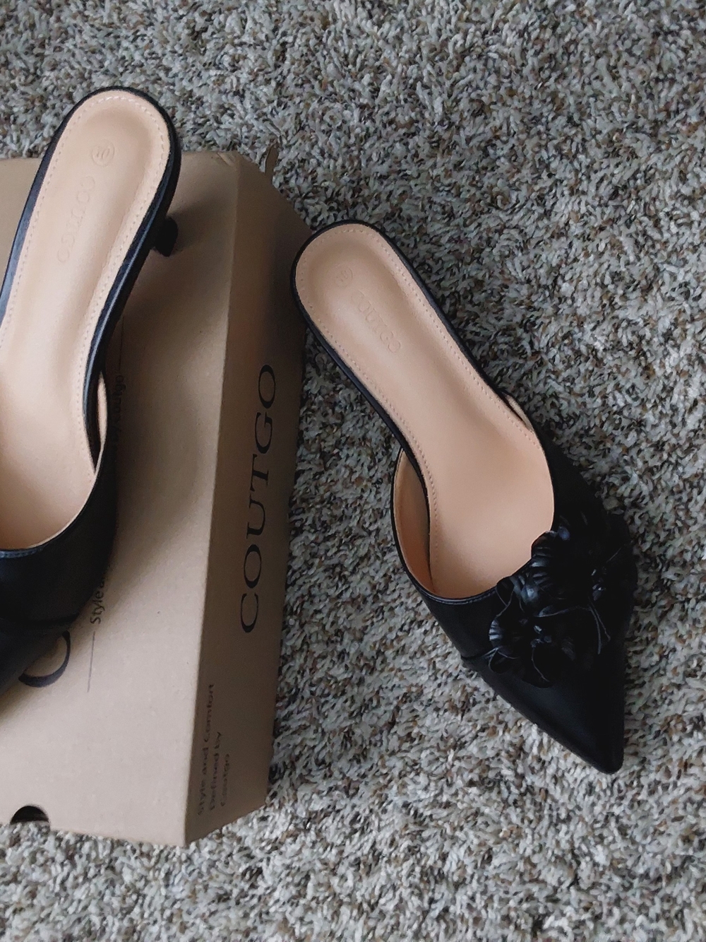 Black Pointed Slip-On Heels with Floral Applique by Coutgo